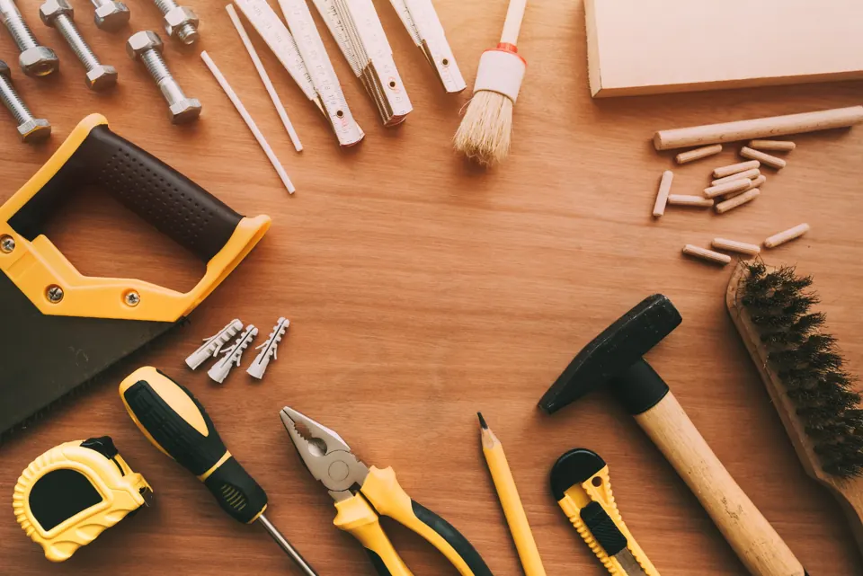 Handyman tools laid out on a table